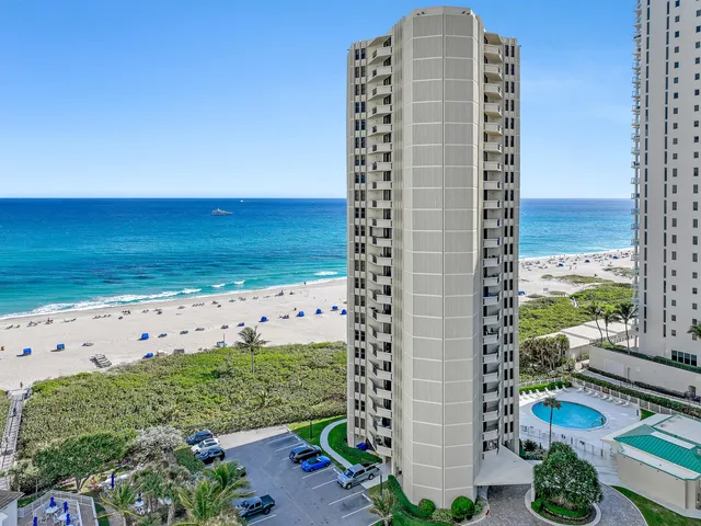 a view of a large building with a yard