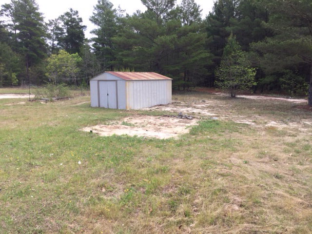 2355 Hortman Mill Road Roberta, GA 31078 - Photo 3 of 9 a backyard of a house