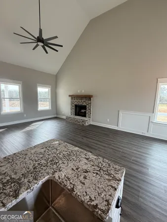 a living room with a rug