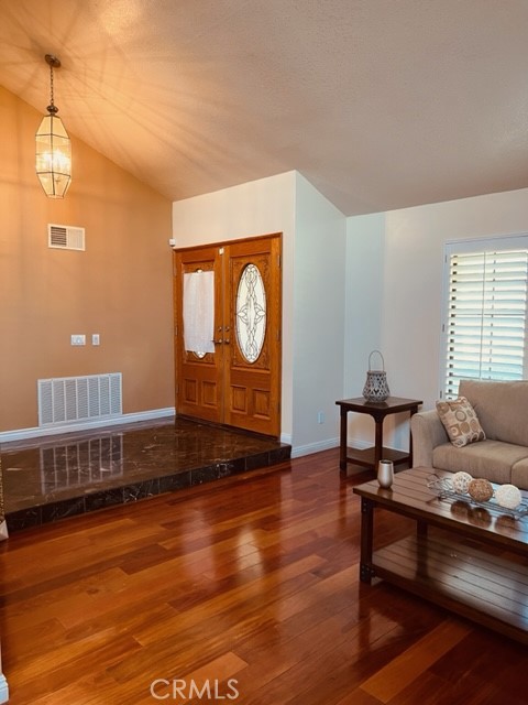 1812 Fairview Drive Corona, CA 92878 - Photo 9 of 15 a living room with furniture and a wooden floor