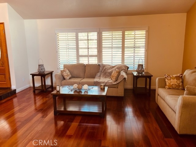 1812 Fairview Drive Corona, CA 92878 - Photo 10 of 15 a living room with furniture and a wooden floor