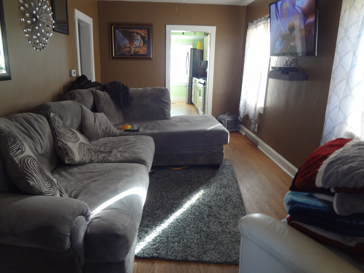 645 Slade Avenue Elgin, IL 60120 - Photo 2 of 7 a living room with furniture and a couch