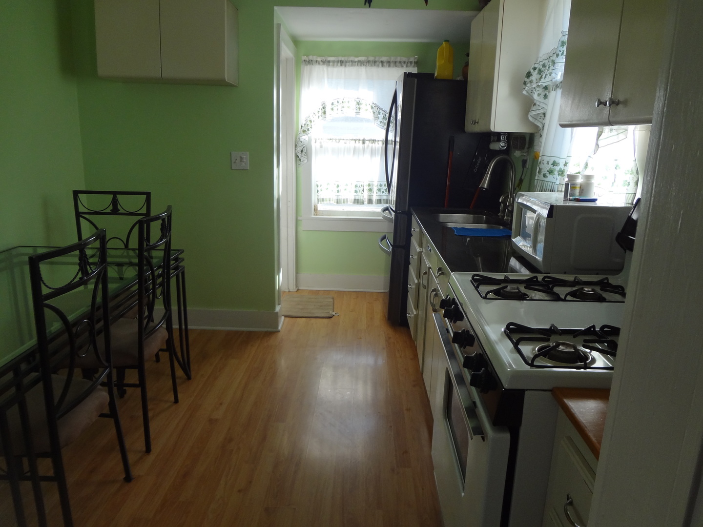 645 Slade Avenue Elgin, IL 60120 - Photo 3 of 7 a room with furniture and a window