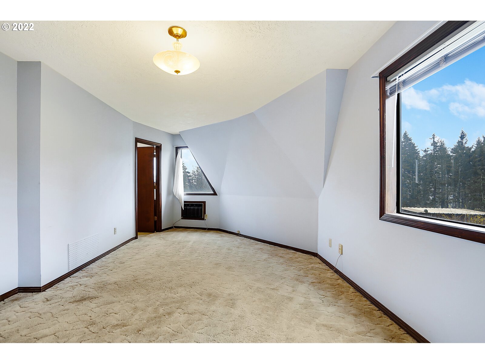 4260 Victor Point Road Northeast Silverton, OR 97381 - Photo 12 of 32 a view of an empty room with a window