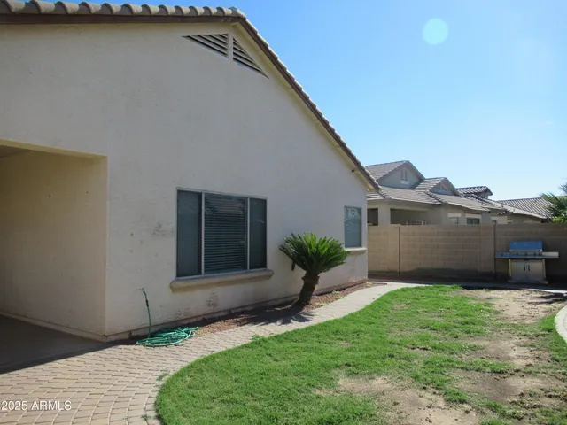 a house view with a garden space