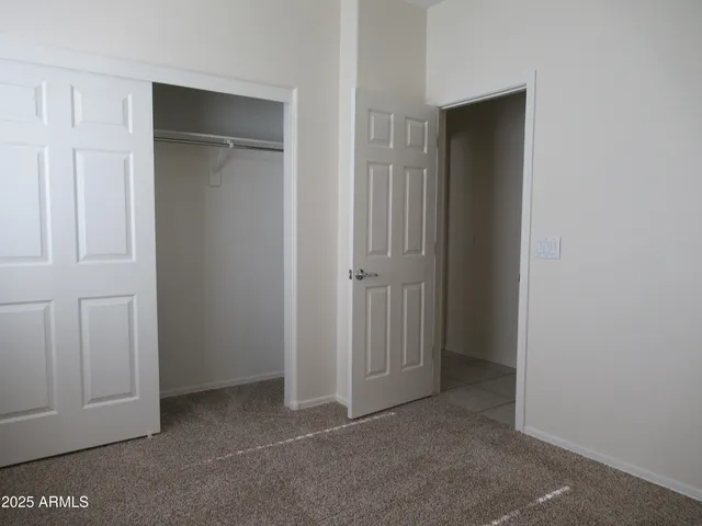 an empty room with closet