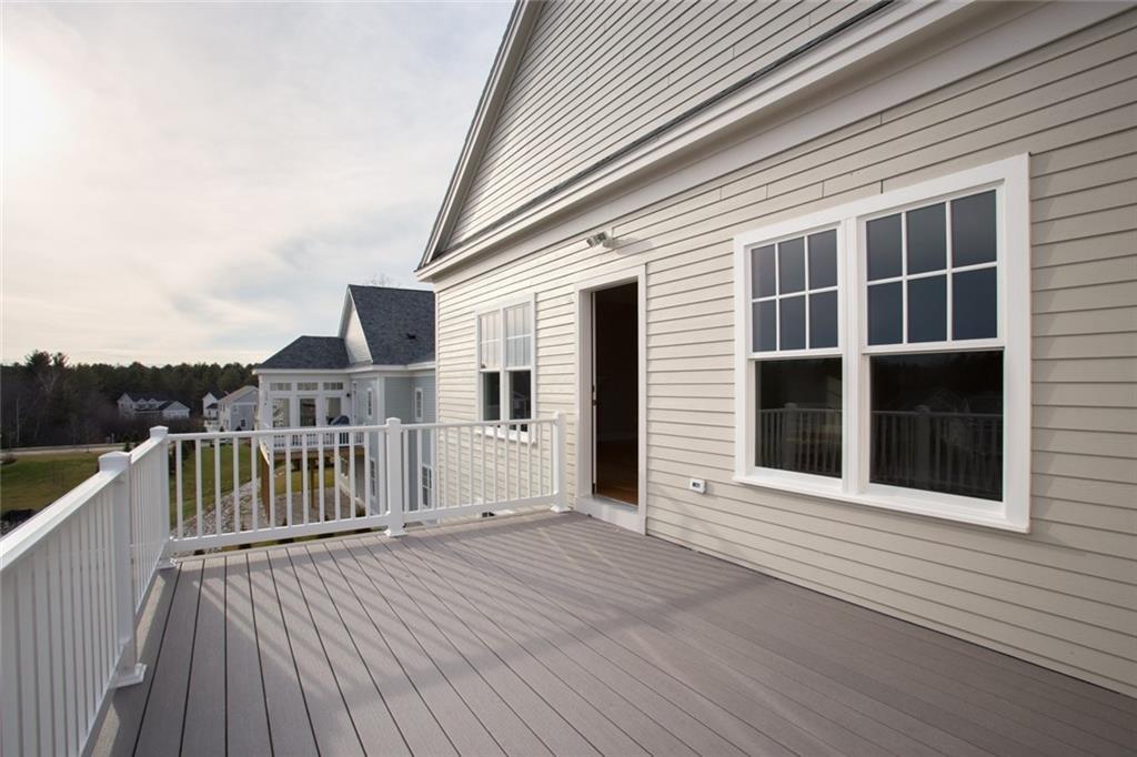 82 Wyman Way Cumberland Center, ME 04021 - Photo 24 of 28 Deck with pond views