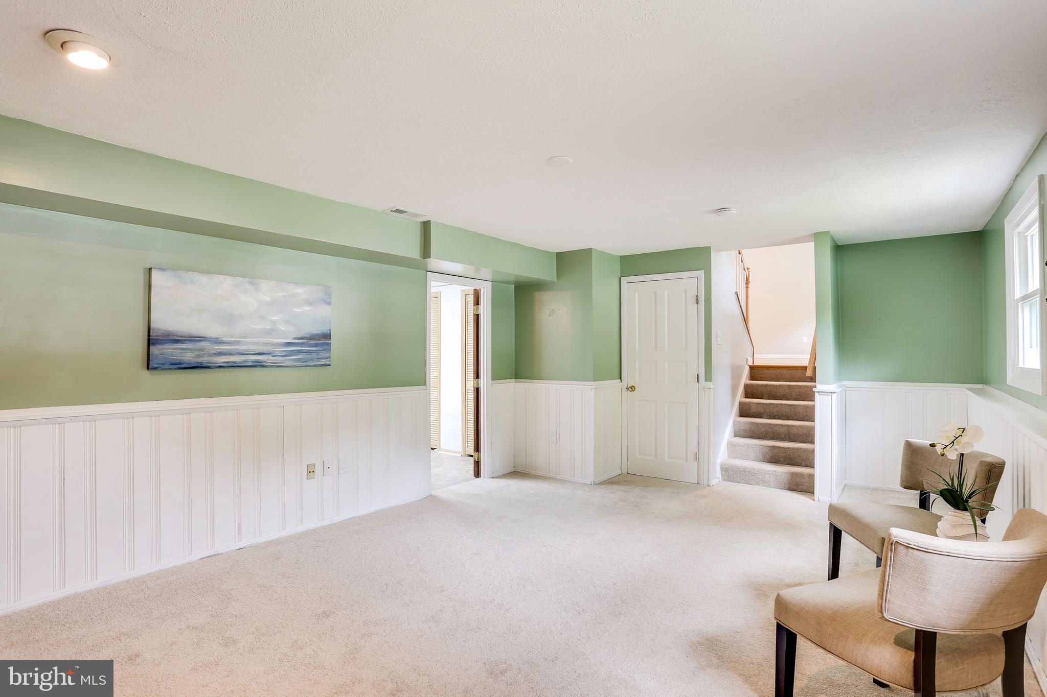 9398 Northgate Road Laurel, MD 20723 - Photo 21 of 27 Wainscoting and updated carpet