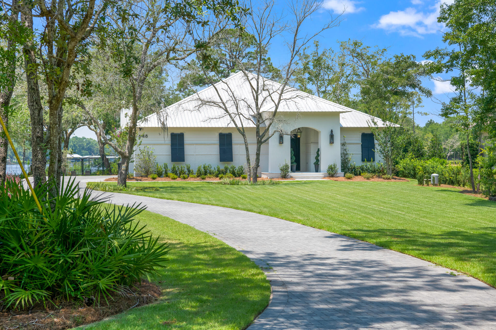 648 Mallet Bayou Road Freeport, FL 32439 - Photo 1 of 86 a front view of house with yard and green space