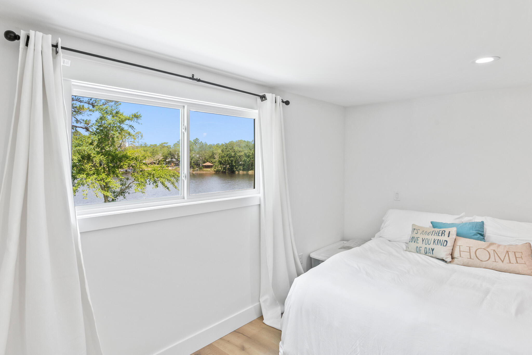 648 Mallet Bayou Road Freeport, FL 32439 - Photo 41 of 86 a bedroom with a bed and a window