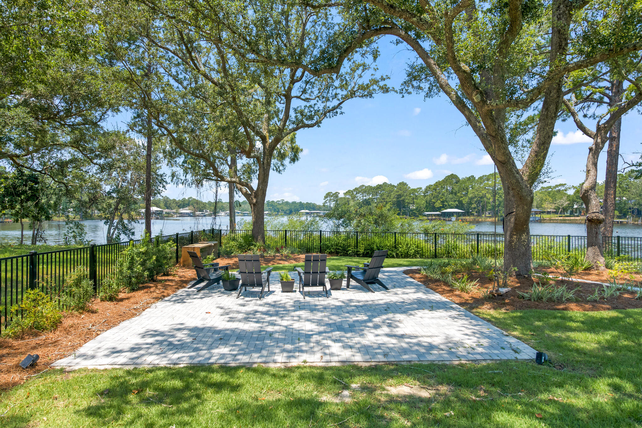 648 Mallet Bayou Road Freeport, FL 32439 - Photo 69 of 86 a view of a park with large trees and a table