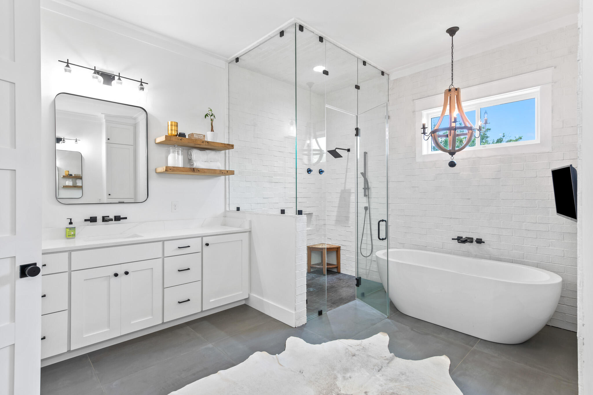 648 Mallet Bayou Road Freeport, FL 32439 - Photo 8 of 86 a bathroom with a tub sink and mirror