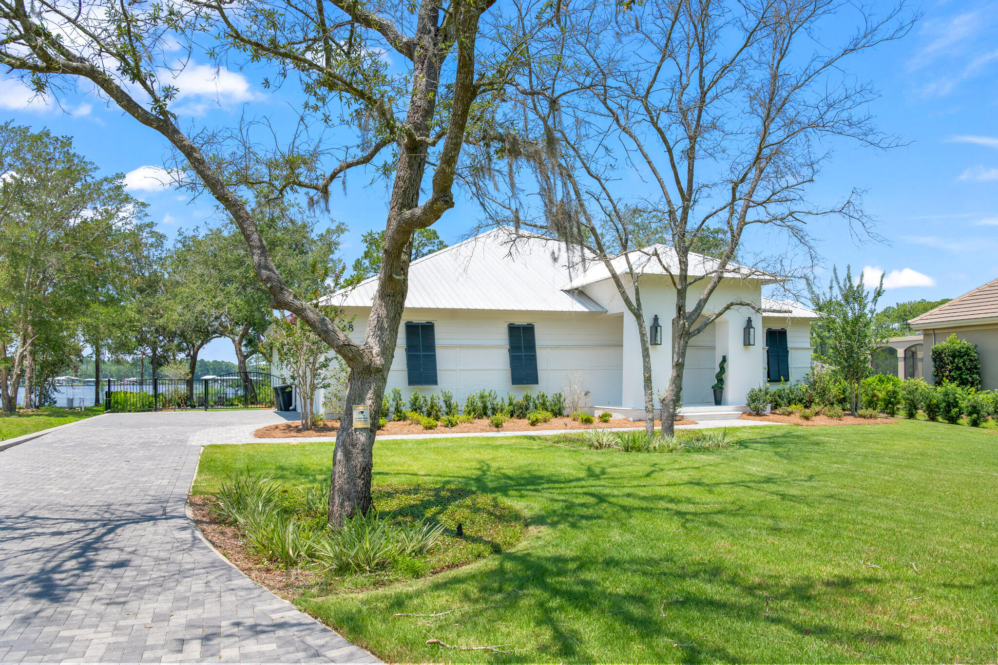 648 Mallet Bayou Road Freeport, FL 32439 - Photo 81 of 86 a front view of a house with a yard and trees