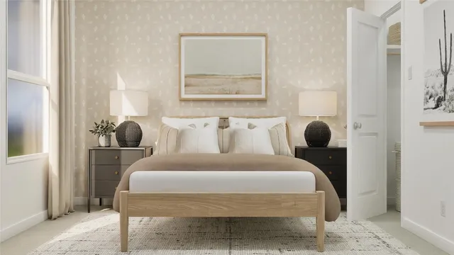 a bedroom with a bed and window