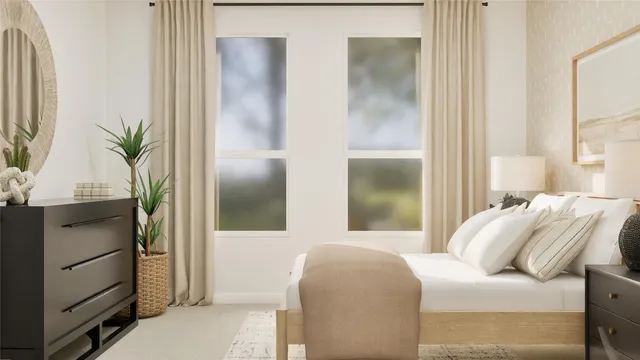 a bedroom with bed and a window