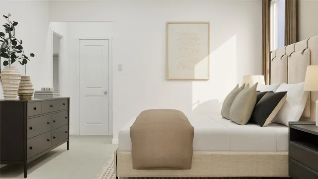 a bedroom with bed and window