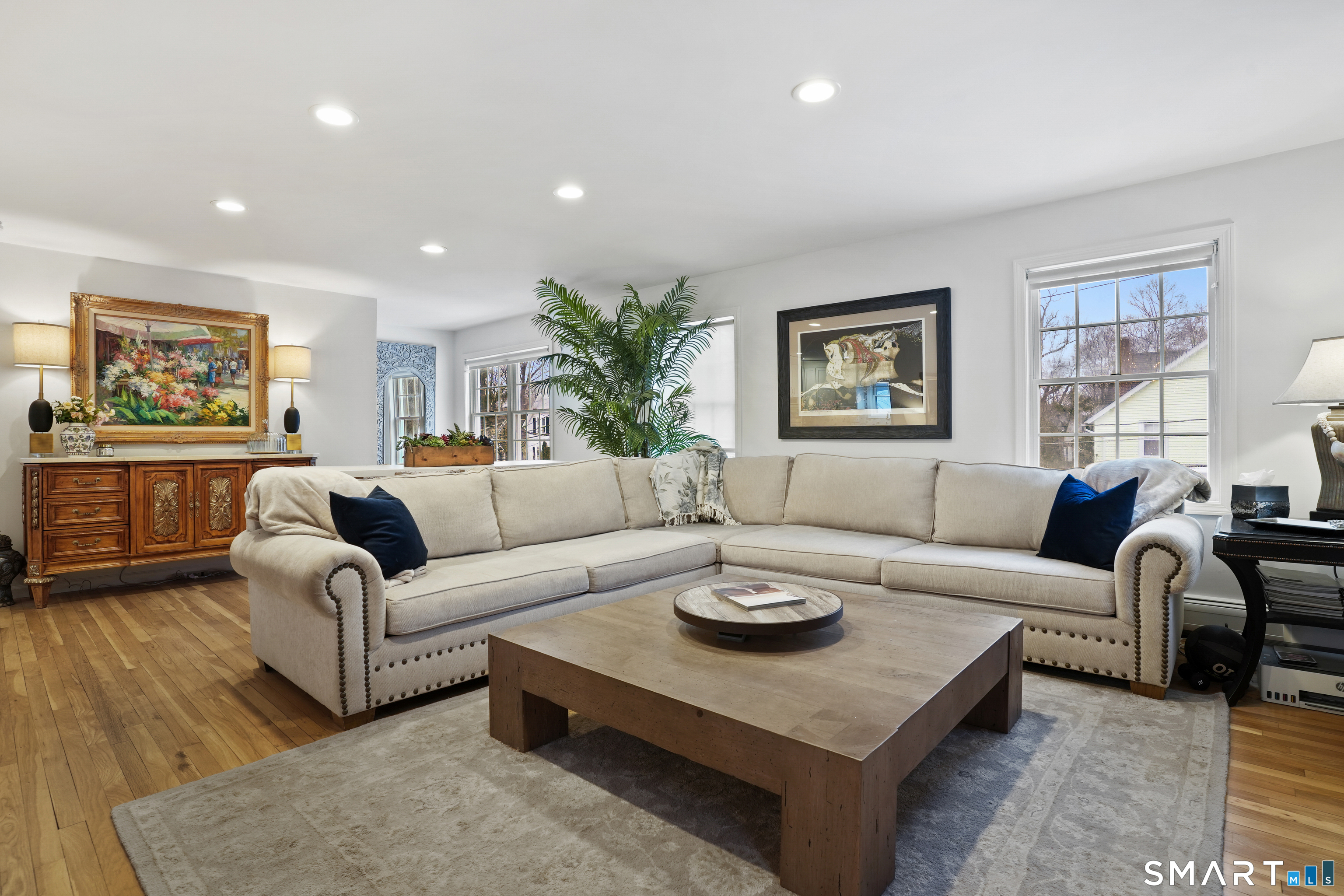 26 Abbott Avenue Ridgefield, CT 06877 - Photo 16 of 34 a living room with furniture potted plant and window