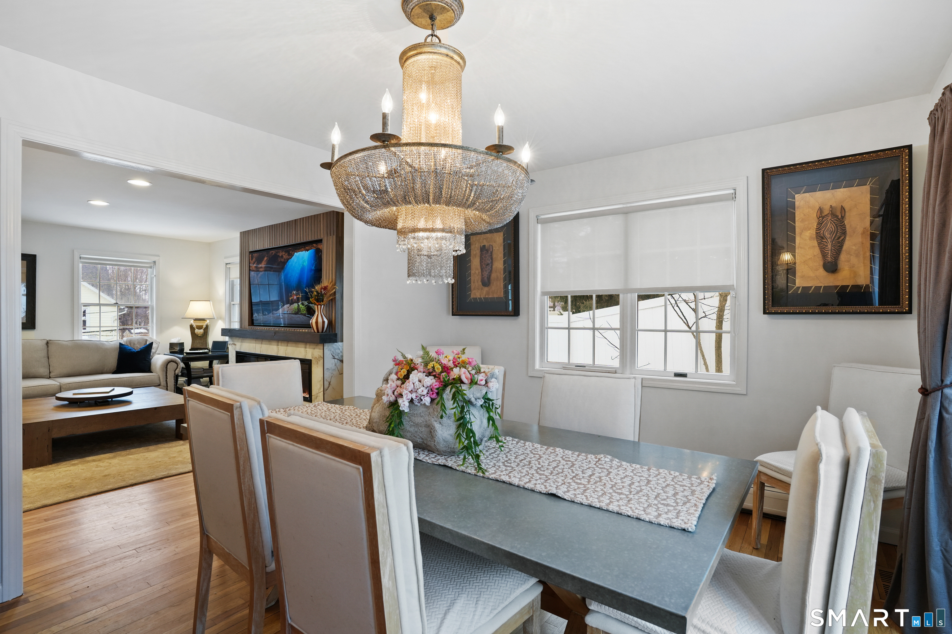 26 Abbott Avenue Ridgefield, CT 06877 - Photo 19 of 34 a view of a dining room with furniture wooden floor and chandelier