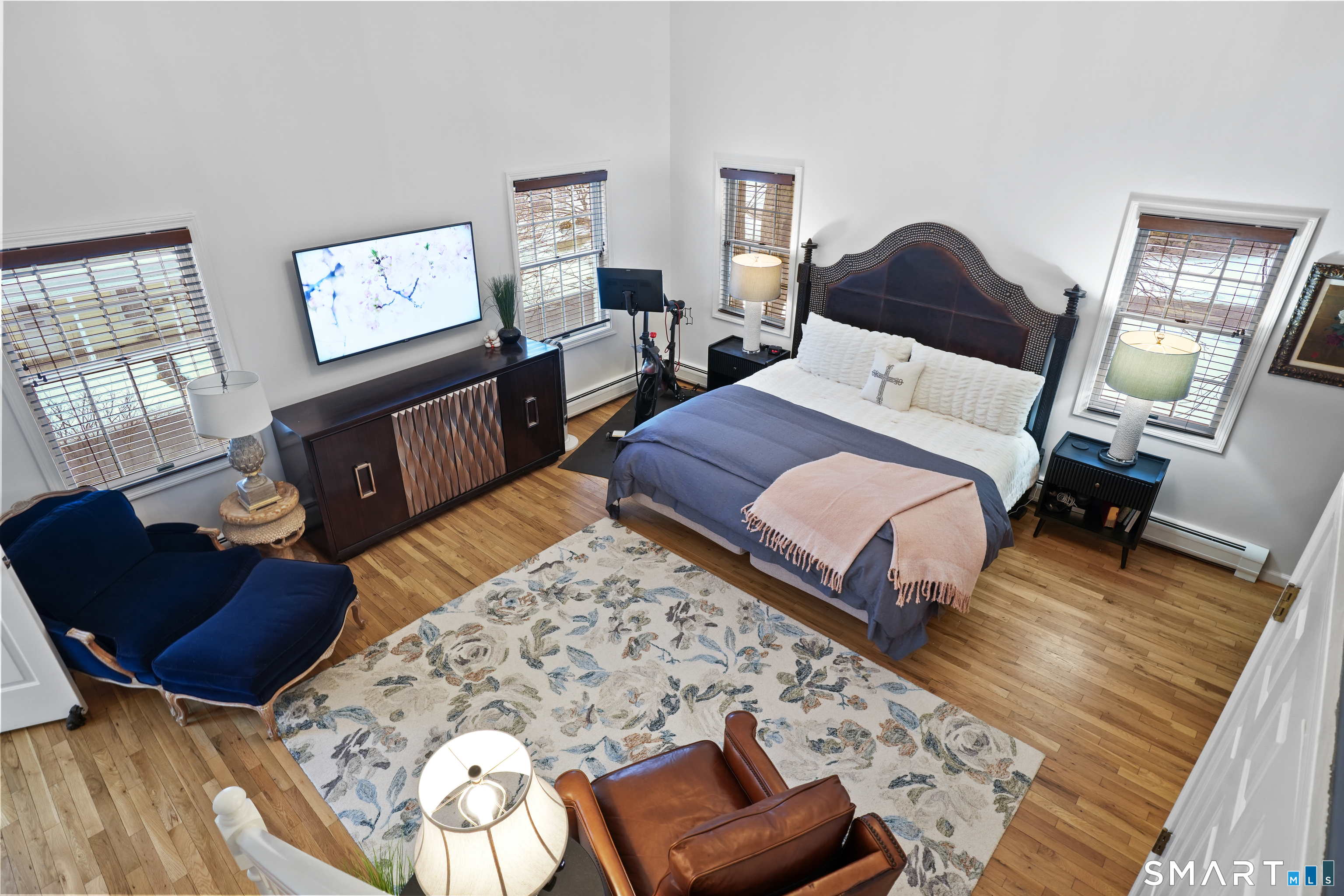 26 Abbott Avenue Ridgefield, CT 06877 - Photo 26 of 34 a bedroom with a bed and wooden floor