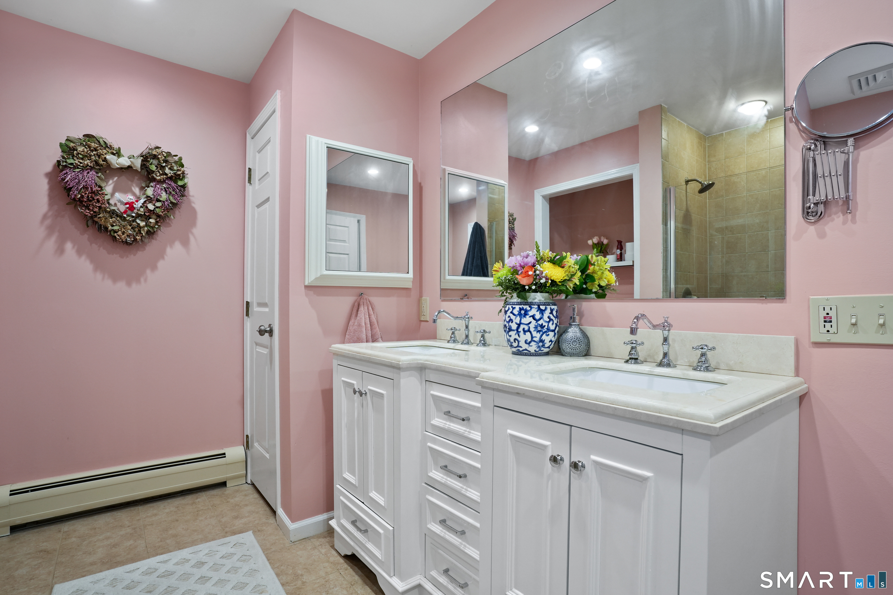 26 Abbott Avenue Ridgefield, CT 06877 - Photo 27 of 34 a bathroom with a sink and a mirror