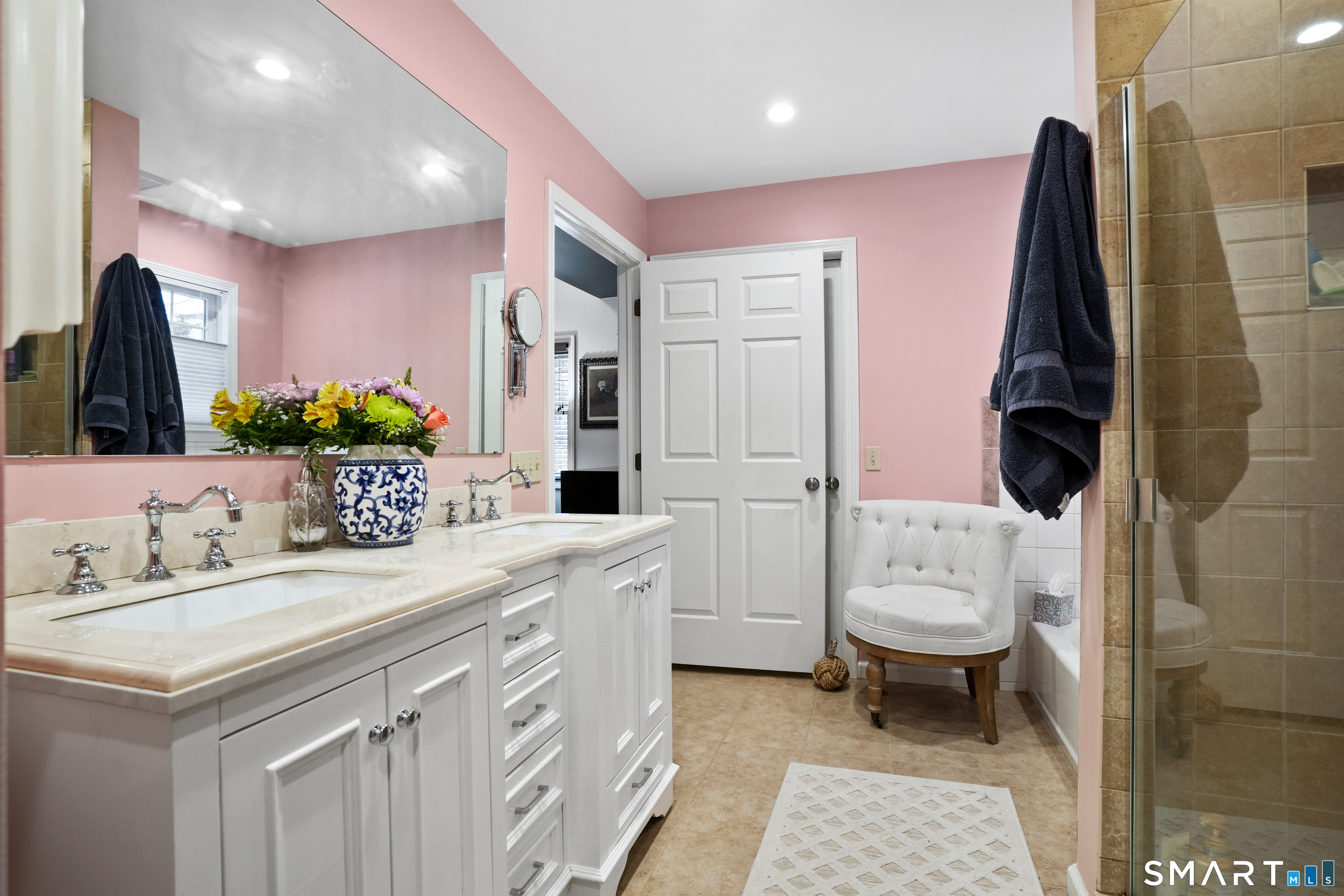 26 Abbott Avenue Ridgefield, CT 06877 - Photo 28 of 34 a bathroom with a sink a toilet and mirror