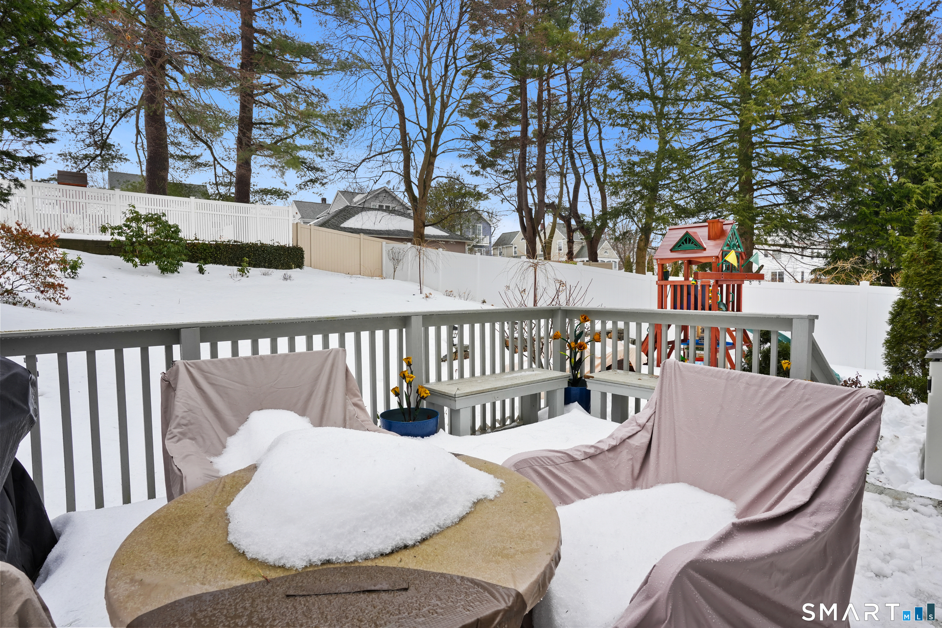 26 Abbott Avenue Ridgefield, CT 06877 - Photo 31 of 34 a roof deck with couches and wooden floor