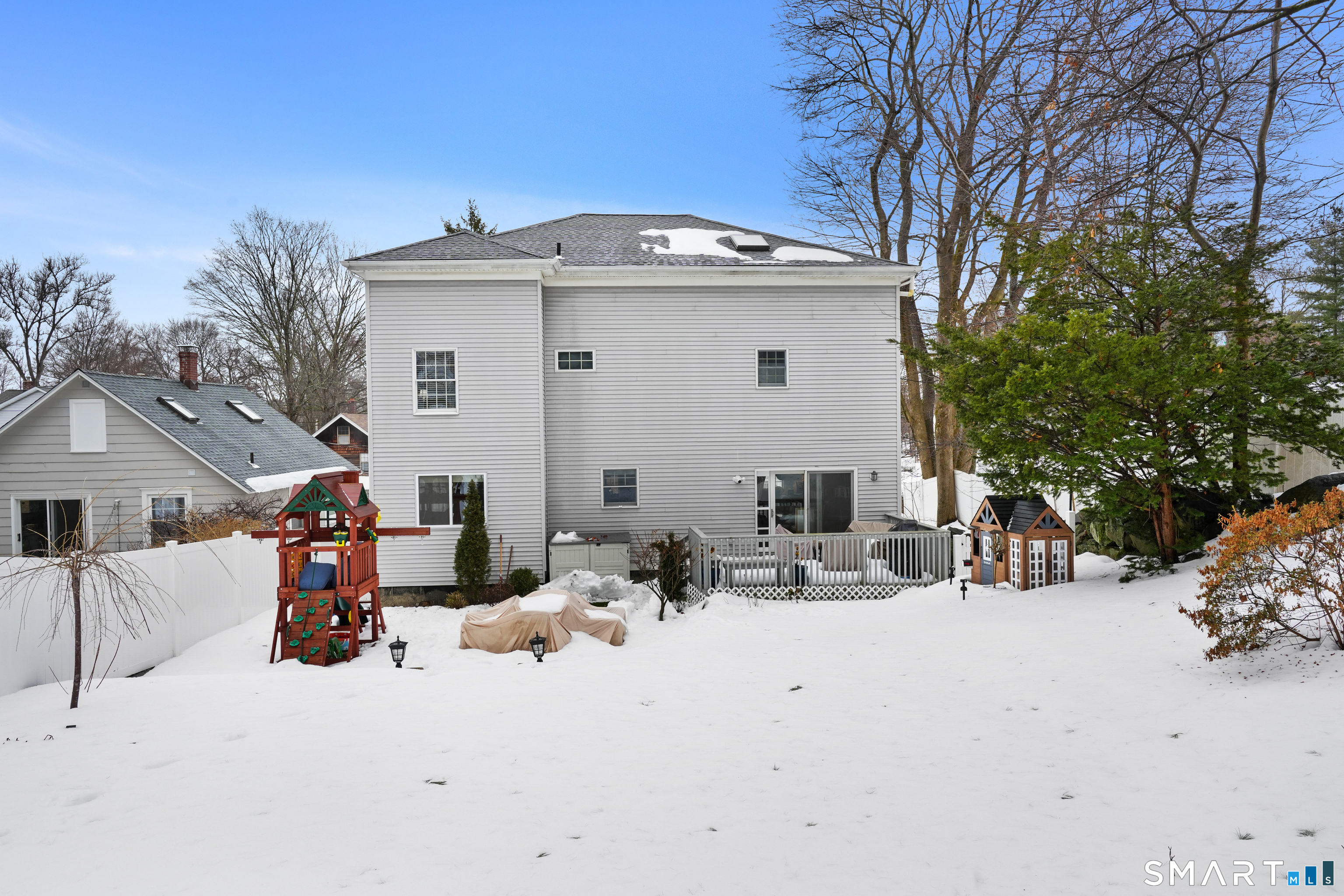 26 Abbott Avenue Ridgefield, CT 06877 - Photo 34 of 34 a view of a house with snow on the road