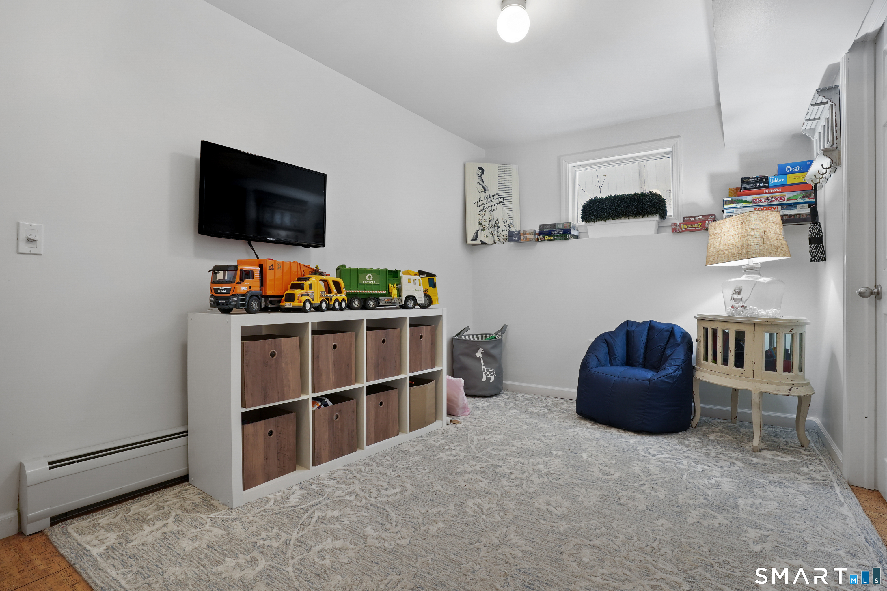 26 Abbott Avenue Ridgefield, CT 06877 - Photo 6 of 34 a room with furniture and flat screen tv