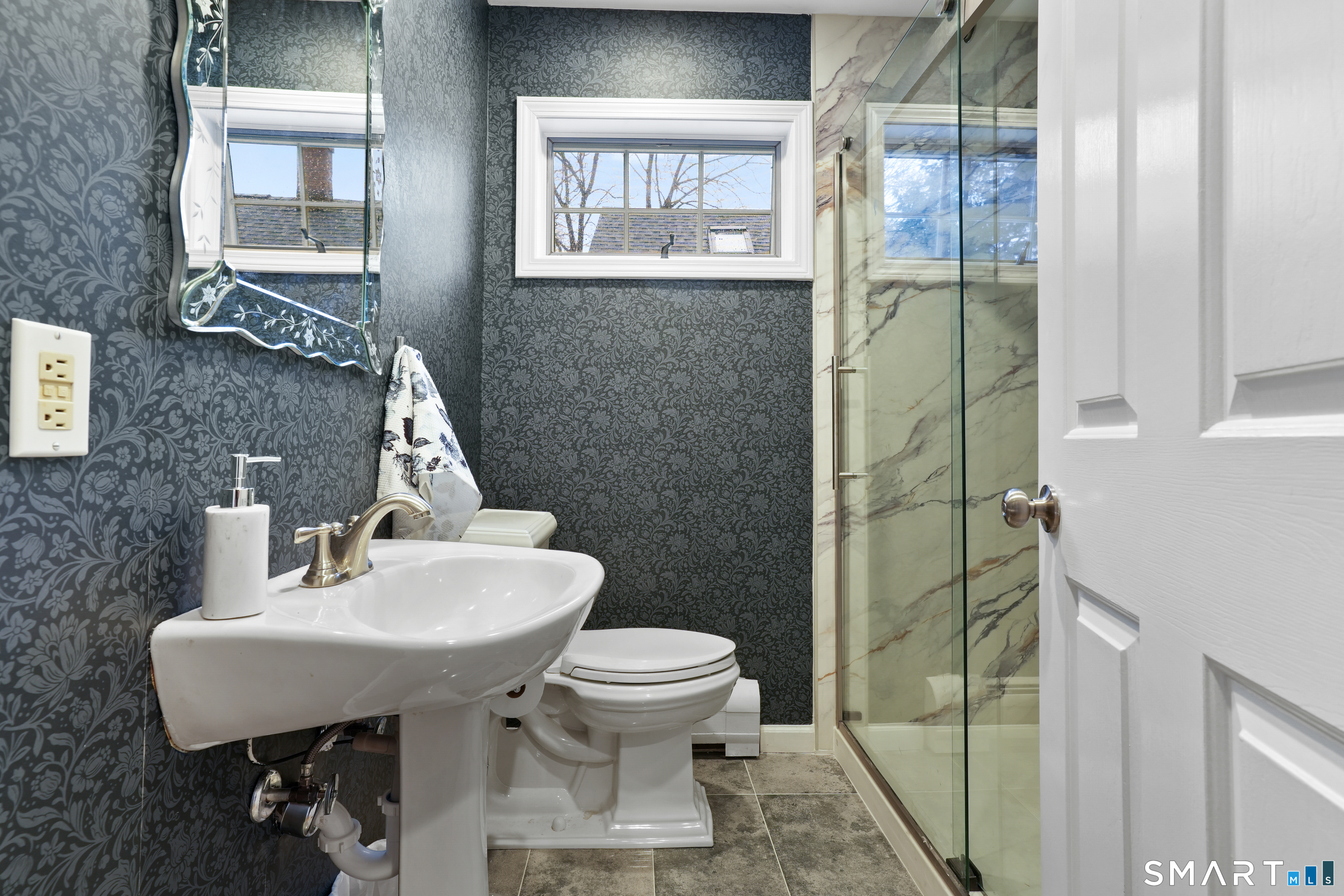 26 Abbott Avenue Ridgefield, CT 06877 - Photo 9 of 34 a bathroom with a sink toilet and shower