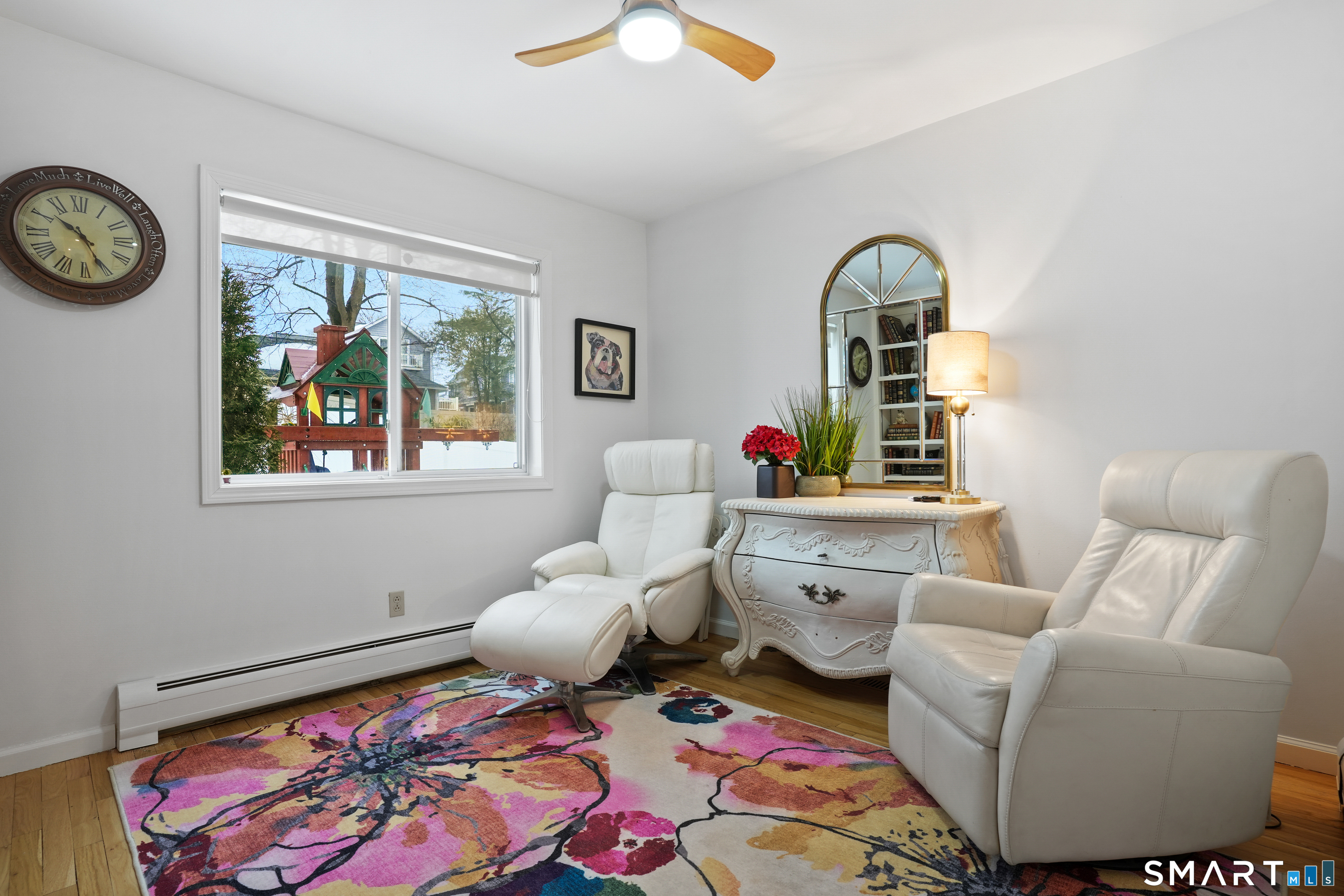 26 Abbott Avenue Ridgefield, CT 06877 - Photo 10 of 34 a living room with furniture and a window