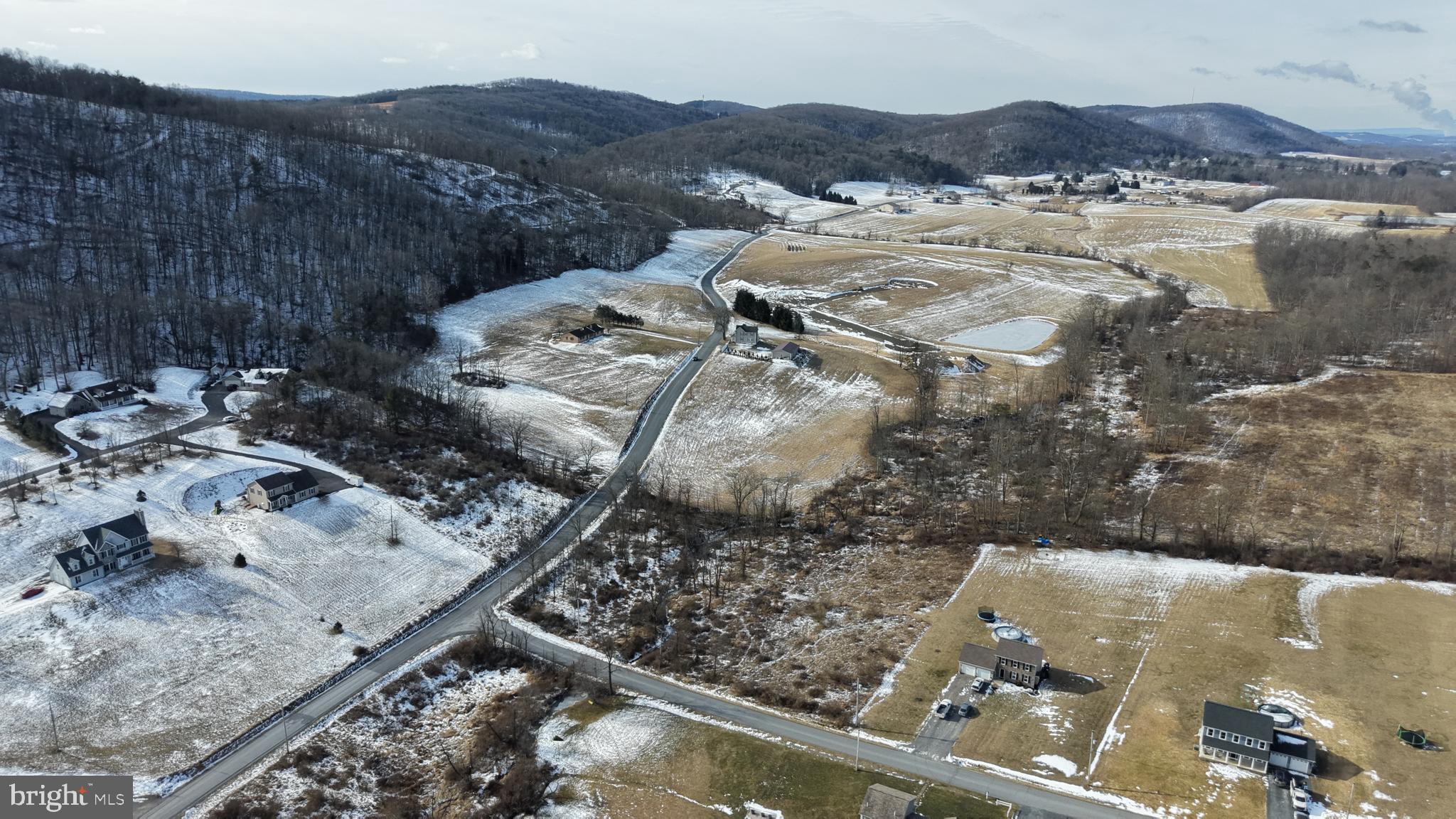 0 Lilac Road Paxinos, PA 17860 - Photo 16 of 21 a view of a backyard with wooden fence