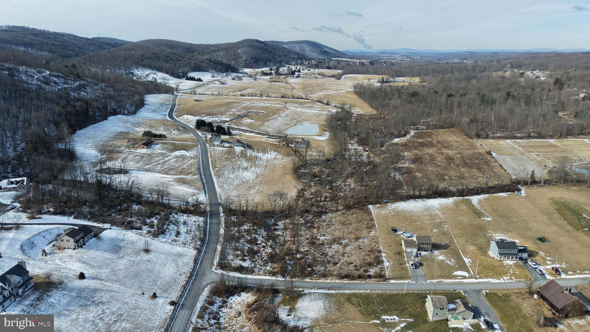 0 Lilac Road Paxinos, PA 17860 - Photo 4 of 21 a view of a water with a mountain