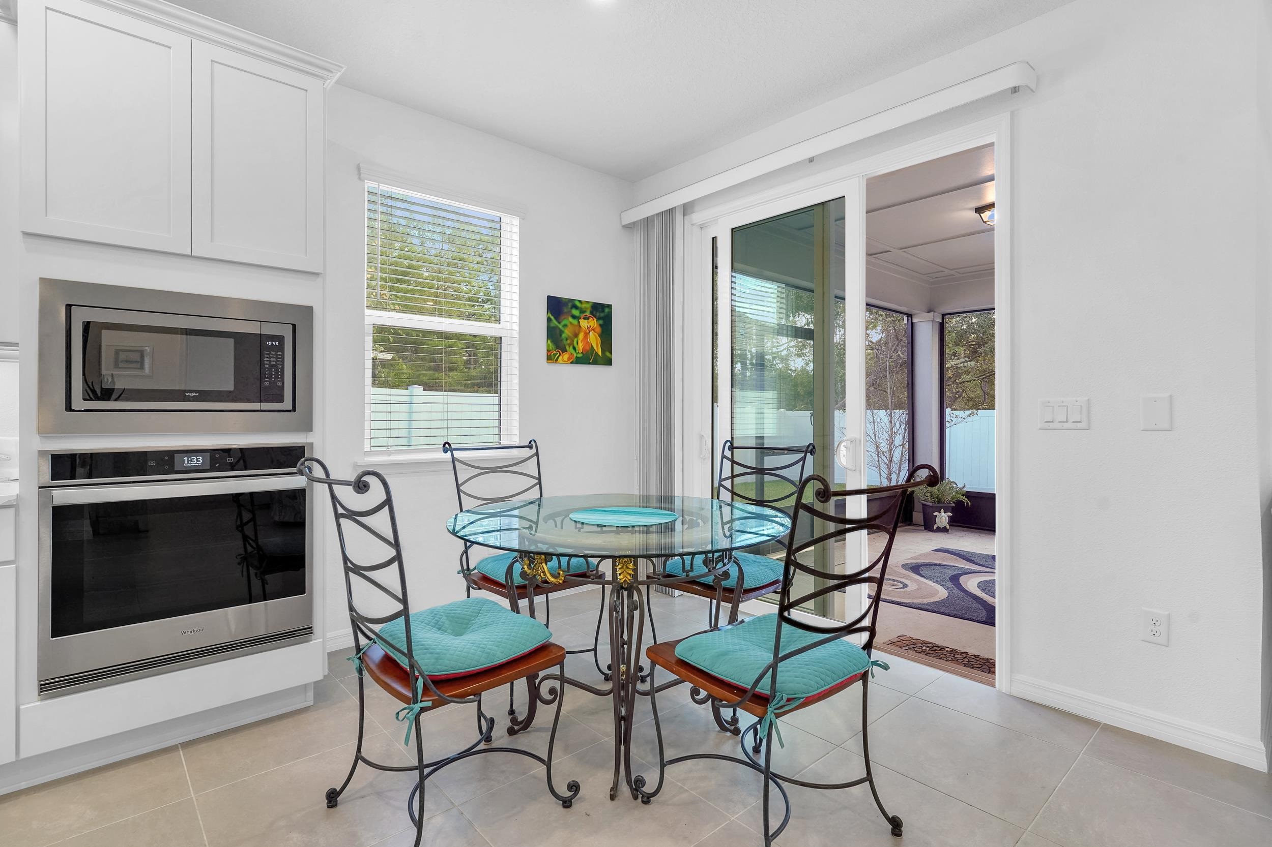 127 Shell Crk Court St. Augustine, FL 32086 - Photo 11 of 37 a dining room with furniture and fireplace