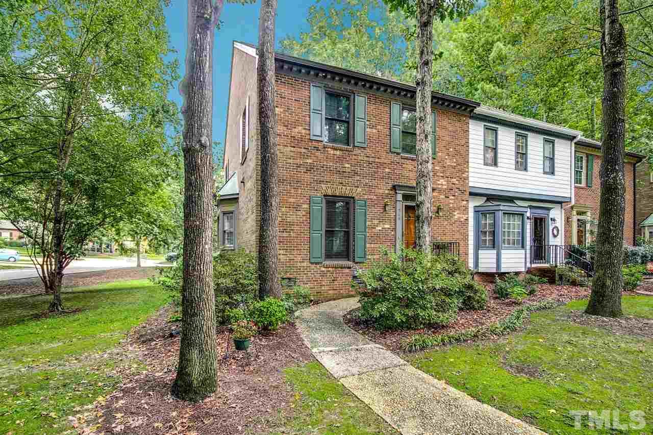 566 Weathergreen Drive Raleigh, NC 27615 - Photo 2 of 28 a front view of a house with garden