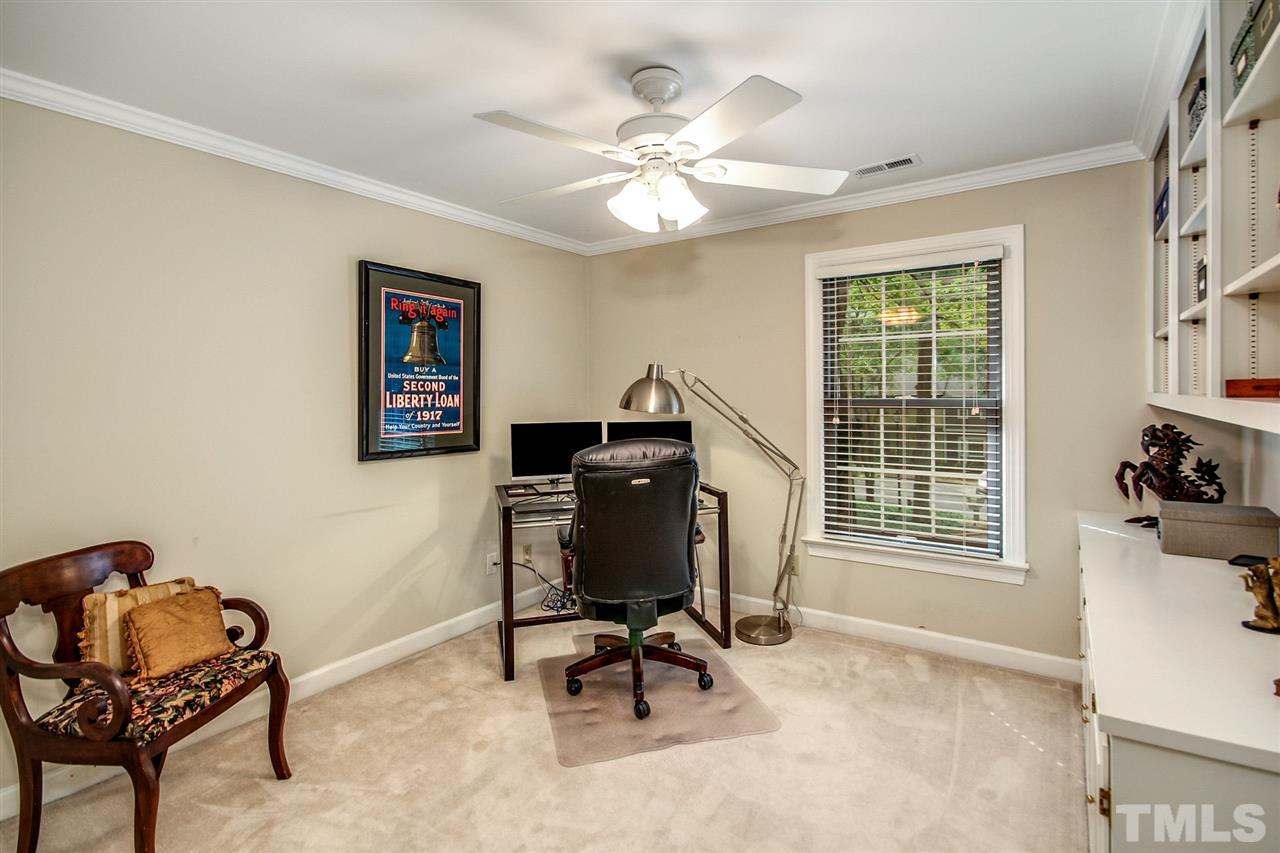 566 Weathergreen Drive Raleigh, NC 27615 - Photo 20 of 28 a living room with furniture and a window