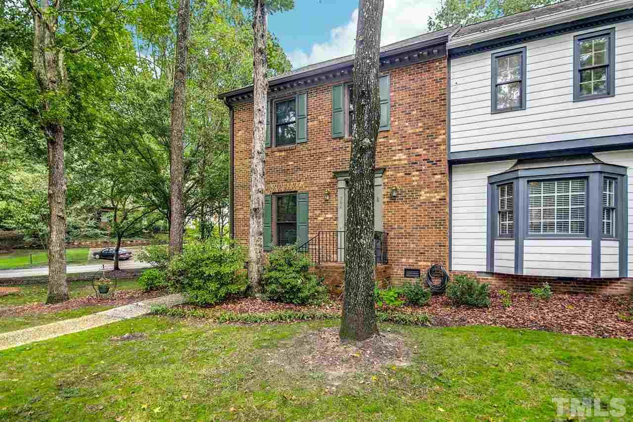 566 Weathergreen Drive Raleigh, NC 27615 - Photo 3 of 28 a view of a house with a yard and plants