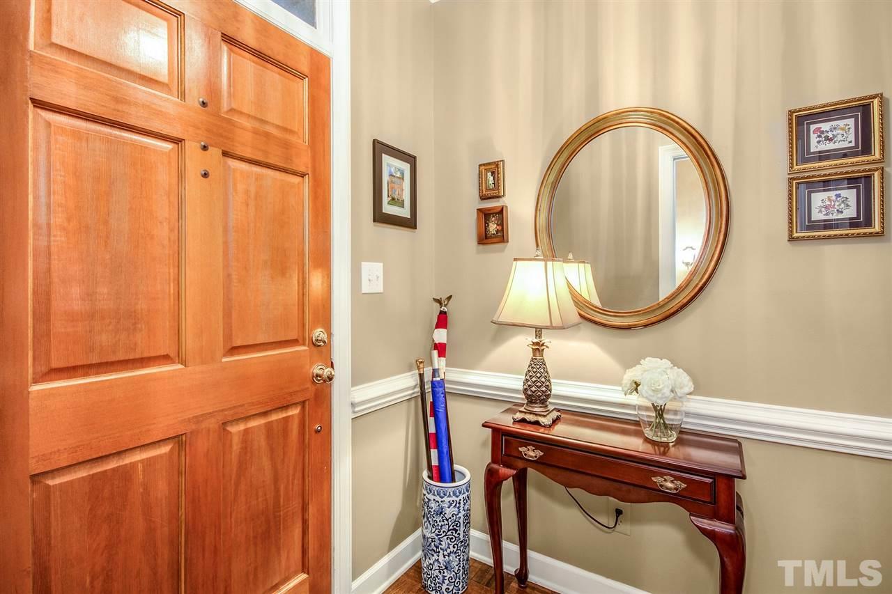566 Weathergreen Drive Raleigh, NC 27615 - Photo 5 of 28 a bathroom with a sink and a mirror