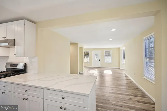 a bedroom with a bed and cabinets