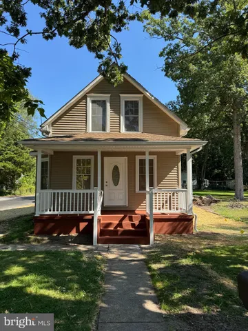 a view of a yard with swimming pool
