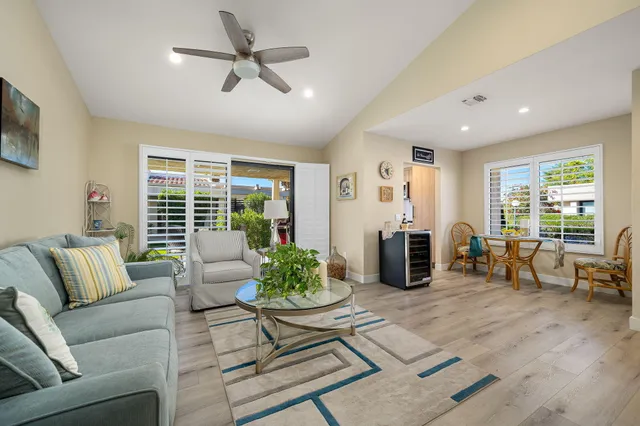 a living room with furniture and a table