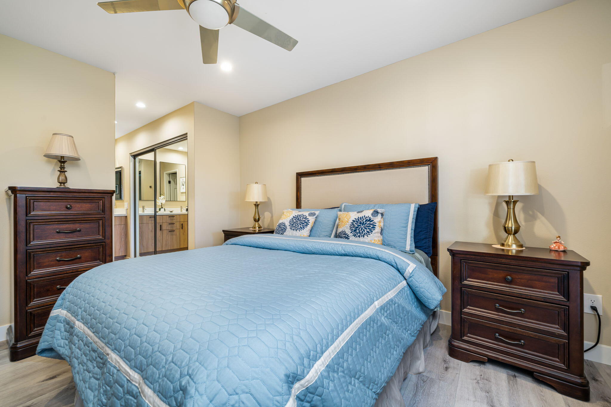 255 Vía Rengo Palm Desert, CA 92260 - Photo 20 of 32 a bedroom with a bed and furniture