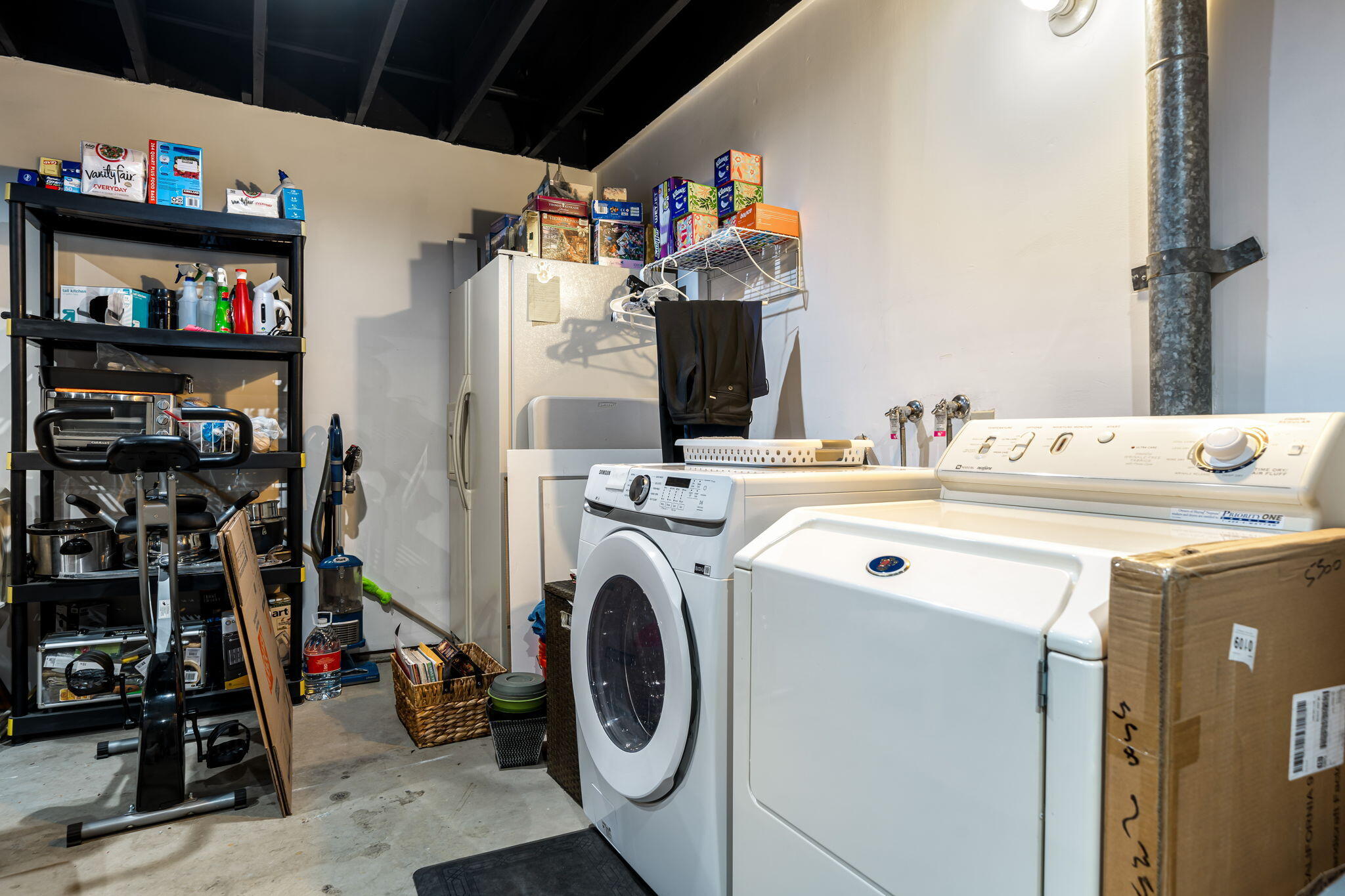 255 Vía Rengo Palm Desert, CA 92260 - Photo 32 of 32 a utility room with dryer washer and other items