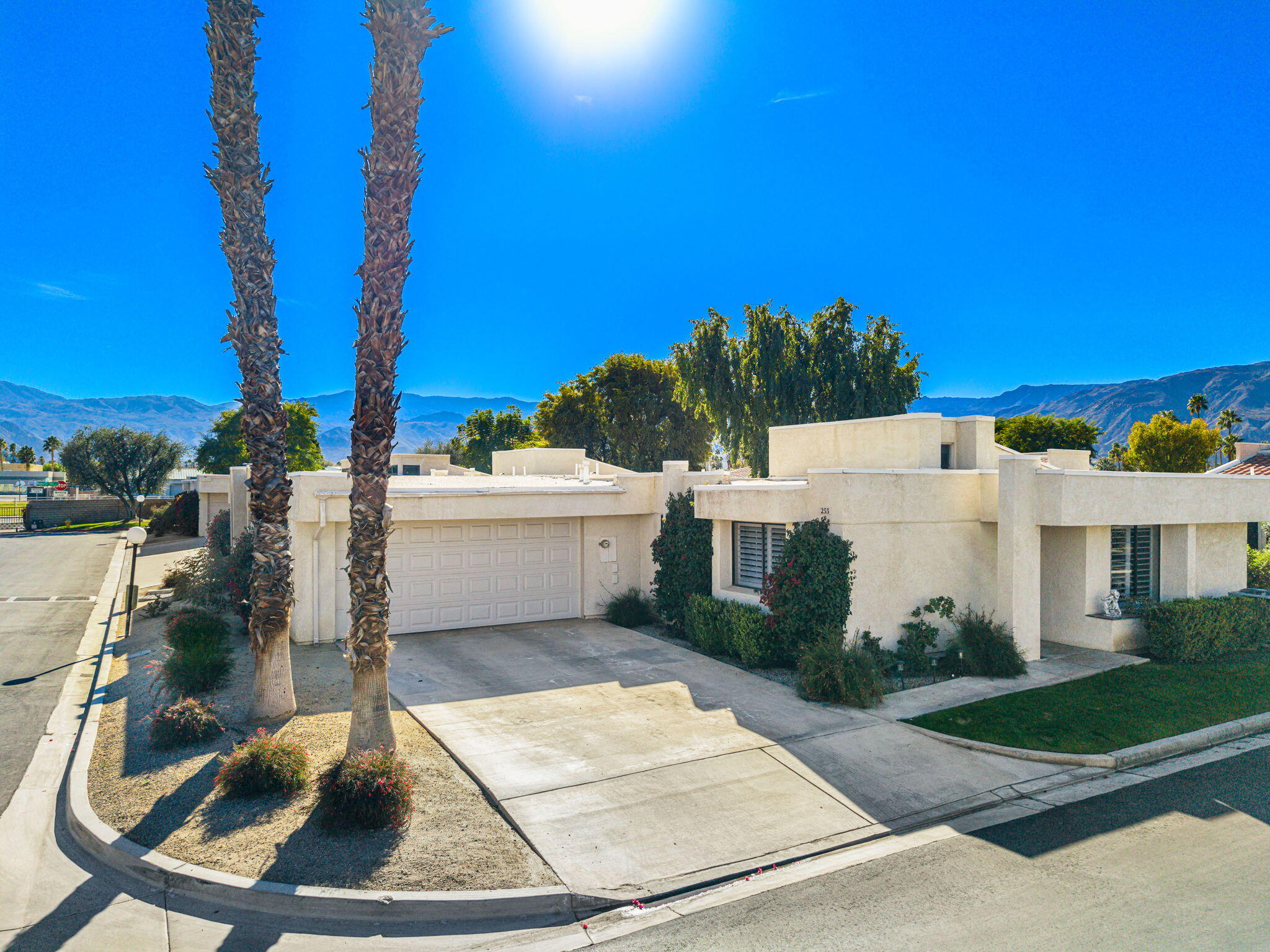 255 Vía Rengo Palm Desert, CA 92260 - Photo 5 of 32 a house view with a outdoor space