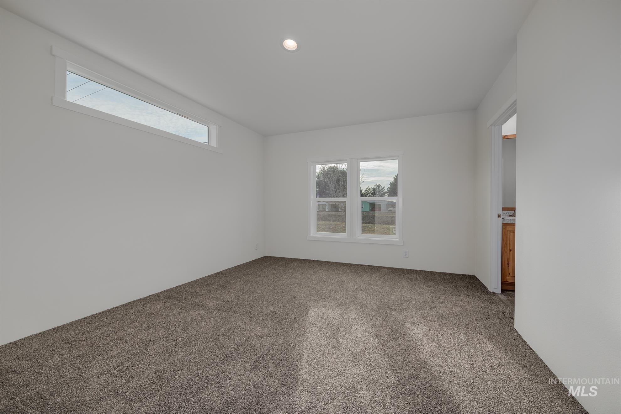 2750 Alden Road, Unit 8 8 Fruitland, ID 83619 - Photo 16 of 31 View of carpeted spare room
