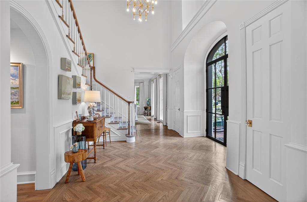 6331 Waggoner Drive Dallas, TX 75230 - Photo 4 of 36 a view of entryway and hall with wooden floor