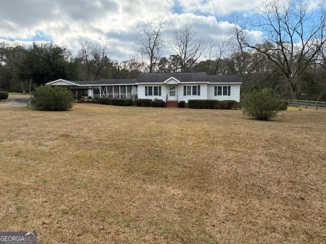 a view of a house with a garden