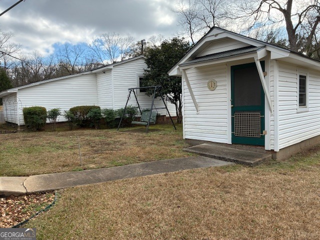 451 Underwood Road Milledgeville, GA 31061 - Photo 24 of 24 a view of a house with a yard