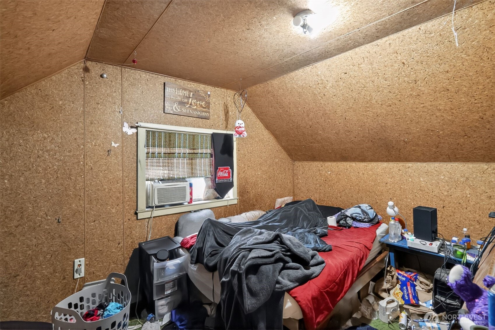 11941 Schold Road Northwest Silverdale, WA 98383 - Photo 11 of 35 a bed room with a bed and a window