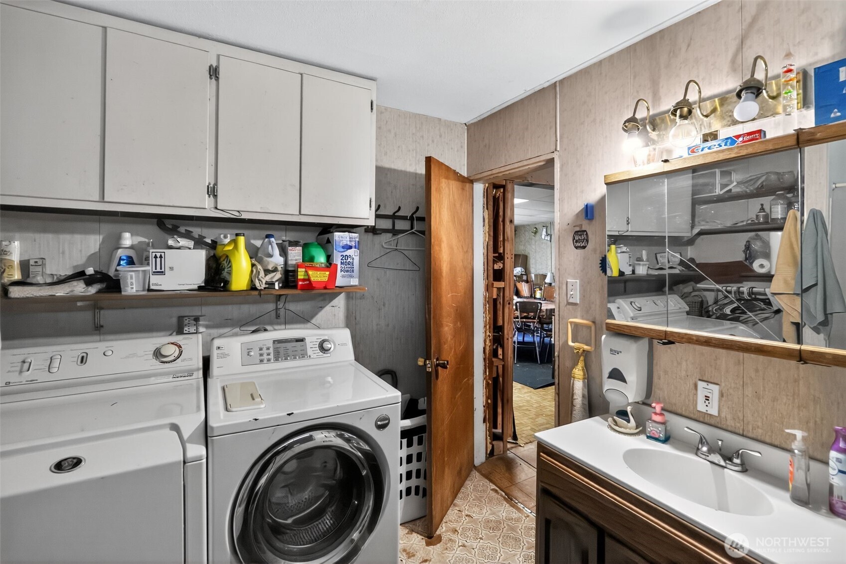 11941 Schold Road Northwest Silverdale, WA 98383 - Photo 17 of 35 a kitchen with stainless steel appliances granite countertop a sink refrigerator and cabinets
