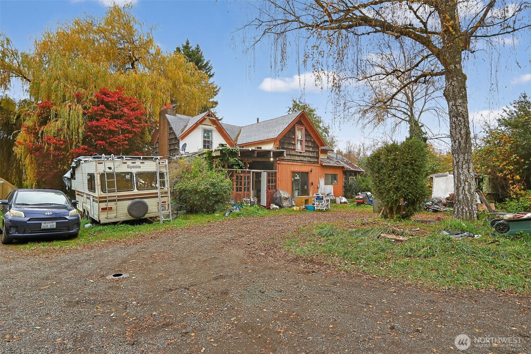 11941 Schold Road Northwest Silverdale, WA 98383 - Photo 2 of 35 a front view of a house with a garden